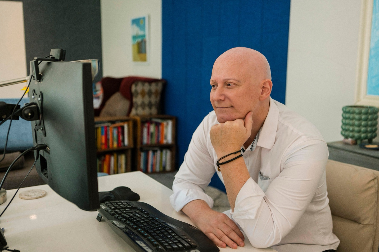 Ian Tenenbaum, founder of Accountable, at his desk